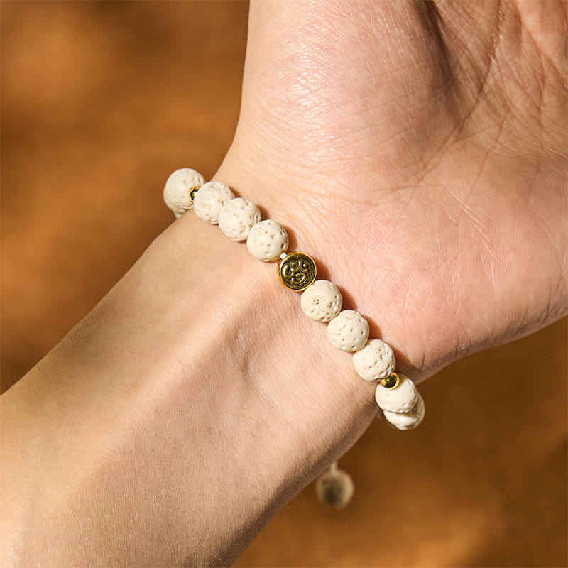 Bracelet de guérison et de calme en Buddha Stones de lave blanches avec symbole Om - image 4