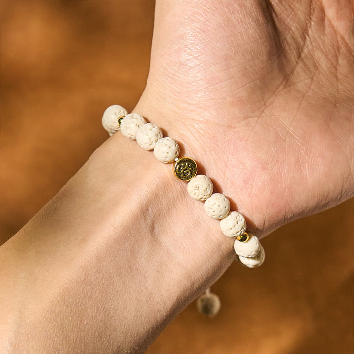 Bracelet de guérison et de calme en Buddha Stones de lave blanches avec symbole Om - image 4