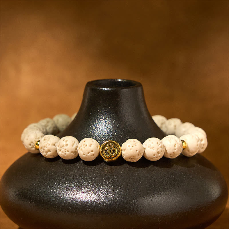 Bracelet de guérison et de calme en Buddha Stones de lave blanches avec symbole Om - image 3