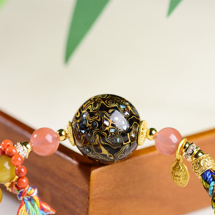 Bracelet de protection en pierre œil de tigre tissé à la main avec perles de laque tibétaine et Buddha Stones - image 10
