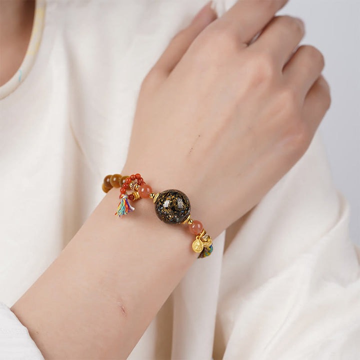 Bracelet de protection en pierre œil de tigre tissé à la main avec perles de laque tibétaine et Buddha Stones - image 4