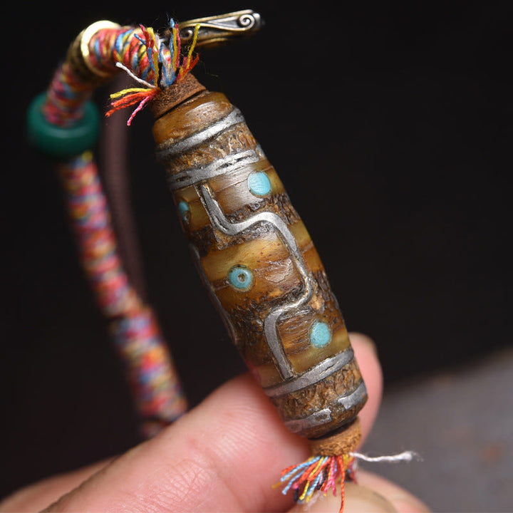 Bracelet de protection en corde de perles tibétaines Dzi à neuf yeux, fabriqué à la main par Buddha Stones - image 1
