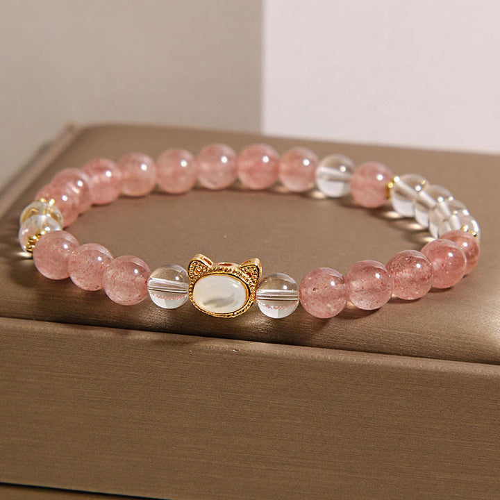 Bracelet de guérison en perles de cristal blanc et quartz fraise naturel Buddha Stones Cat - image 1