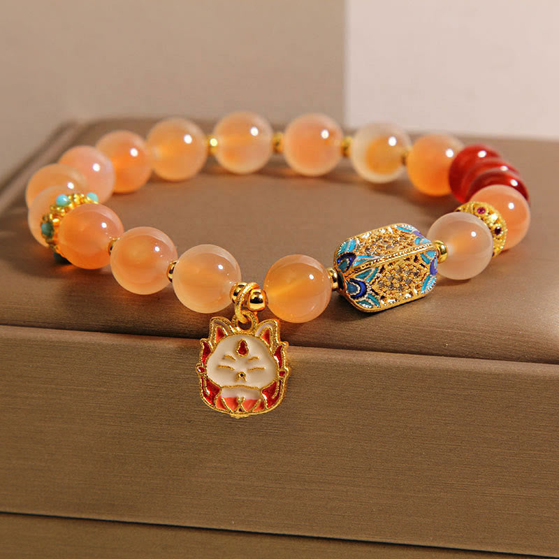 Bracelet de guérison en agate orange bonbon naturelle à neuf queues de Buddha Stones - image 2