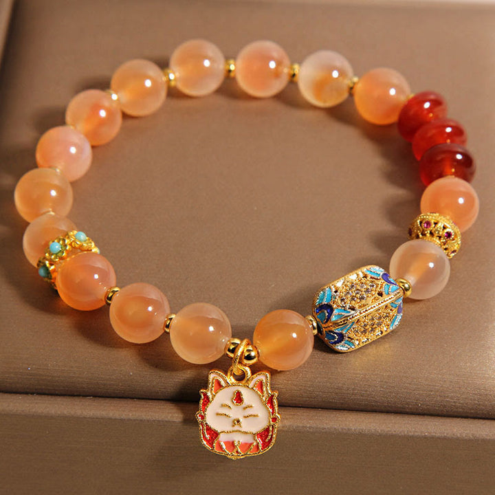 Bracelet de guérison en agate orange bonbon naturelle à neuf queues de Buddha Stones - image 3