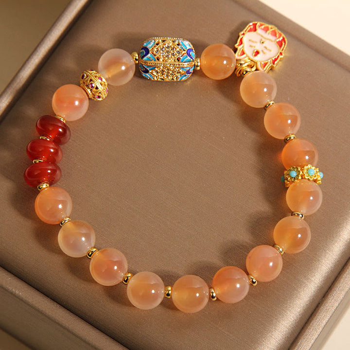 Bracelet de guérison en agate orange bonbon naturelle à neuf queues de Buddha Stones - image 5