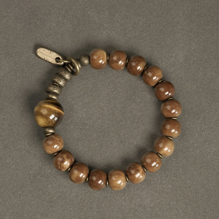 Bracelet porte-bonheur en cuivre et obsidienne dorée avec Buddha Stones de Kuka et œil de tigre