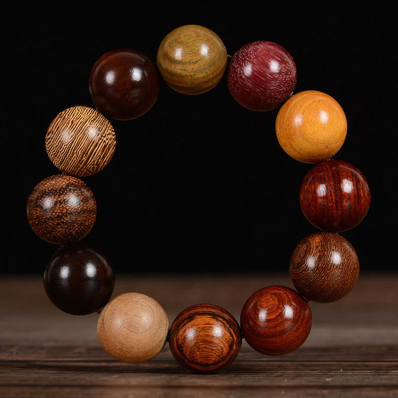 Bracelet de guérison et de protection en bois de santal multicolore Buddha Stones