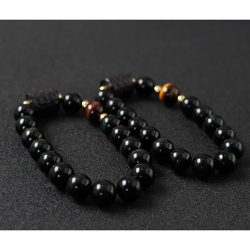 Bracelet de couple en obsidienne noire et bois d'ébène avec œil de tigre rouge