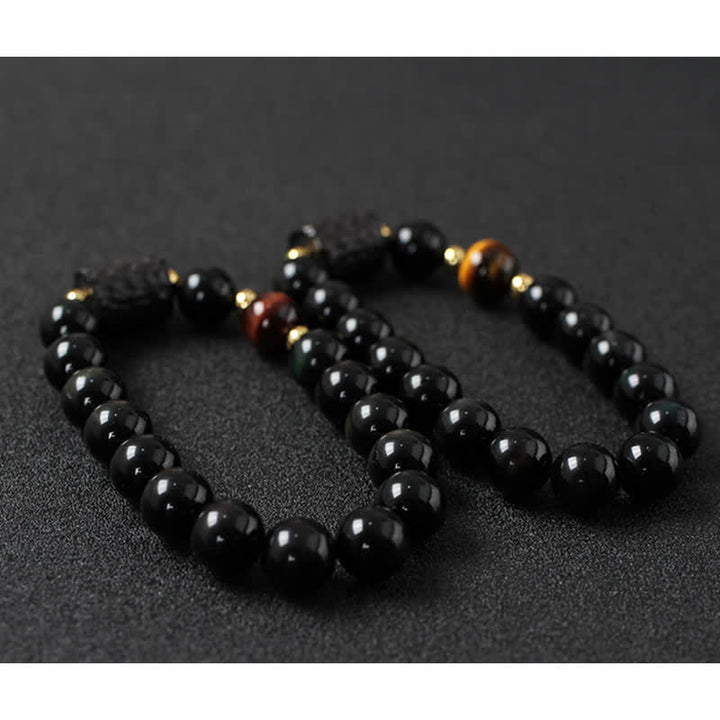 Bracelet de couple en obsidienne noire et bois d'ébène avec œil de tigre rouge