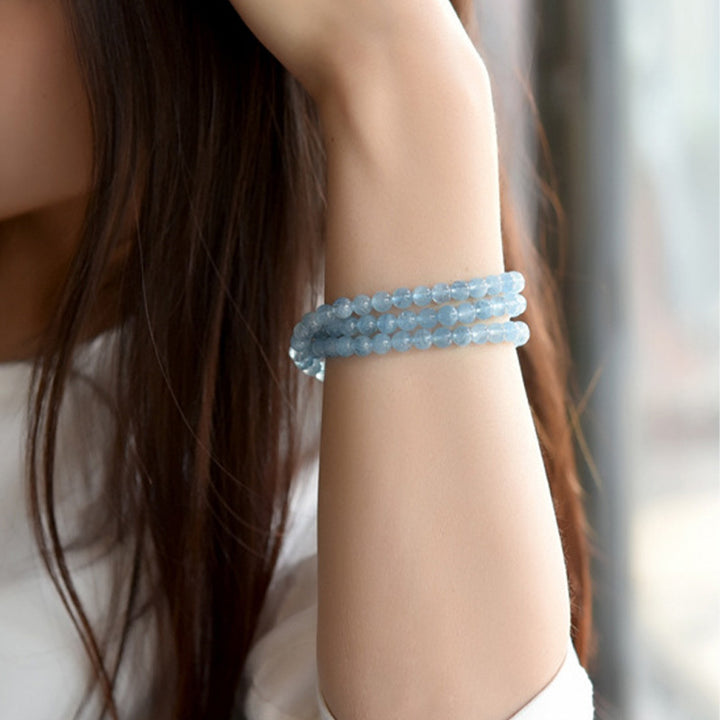 Bracelet de guérison de la paix en aigue-marine naturelle de Buddha Stones
