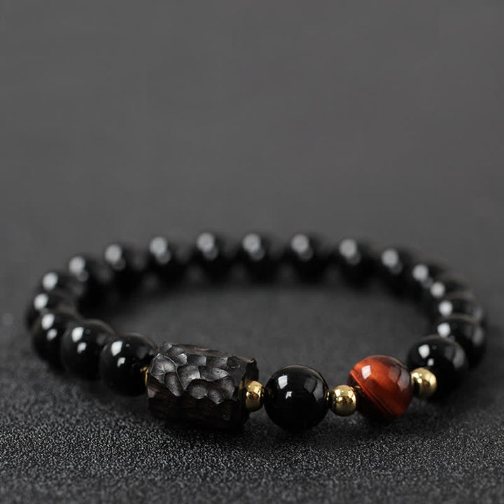 Bracelet de couple en obsidienne noire et bois d'ébène avec œil de tigre rouge