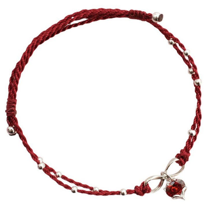 Bracelet de cheville tressé avec symbole de l'infini et du cœur en Buddha Stones