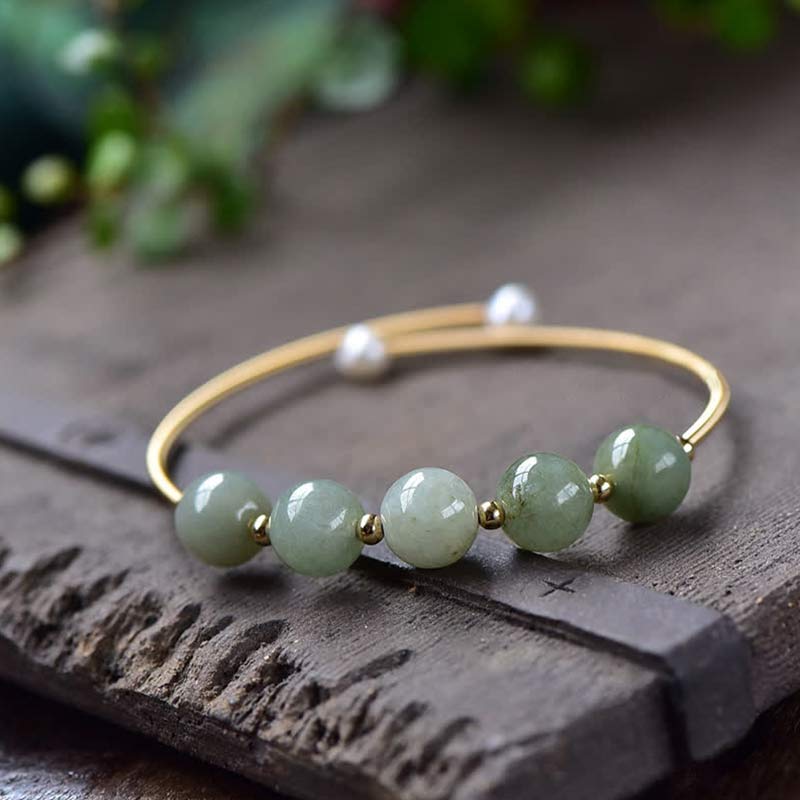 Bracelet jonc en jade avec Buddha Stones et bénédictions pour la chance et l'abondance