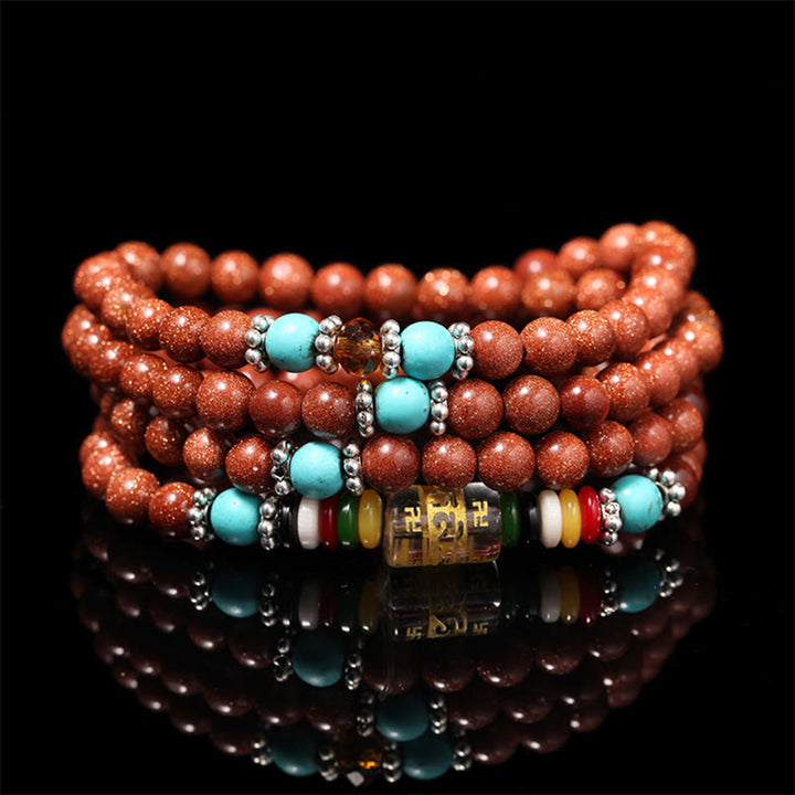 Bracelet de confiance avec 108 perles Mala en Buddha Stones Goldstone Om Mani Padme Hum Swastika