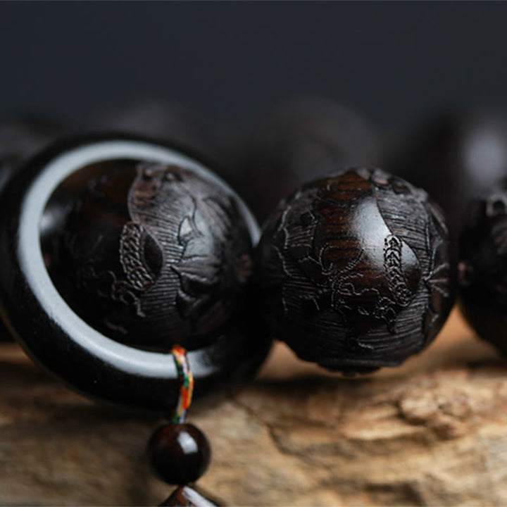 Bracelet d'équilibre en bois d'ébène avec Buddha Stones et caractères chinois Yin Yang gravés