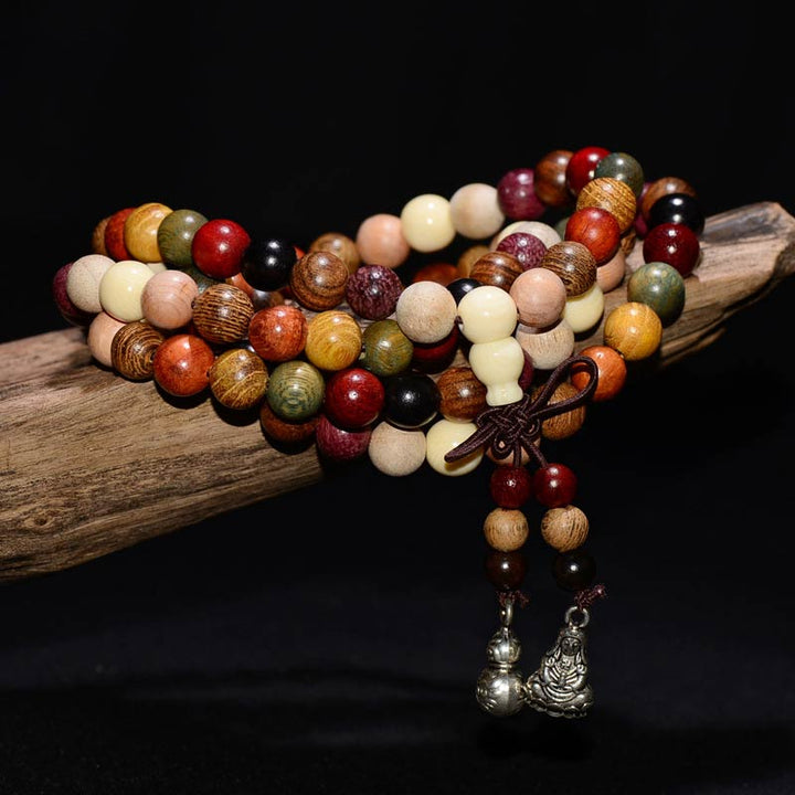 Bracelet de méditation et de bénédiction Mala en bois de wengé avec 108 perles de Buddha Stones