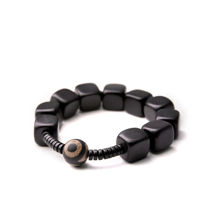 Bracelet de force en perles dzi en bois d'ébène tibétain avec Buddha Stones