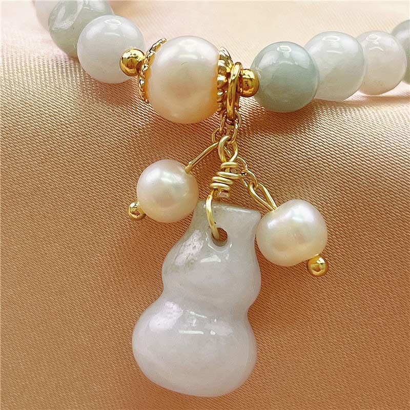 Bracelet à breloques en jade et Buddha Stones