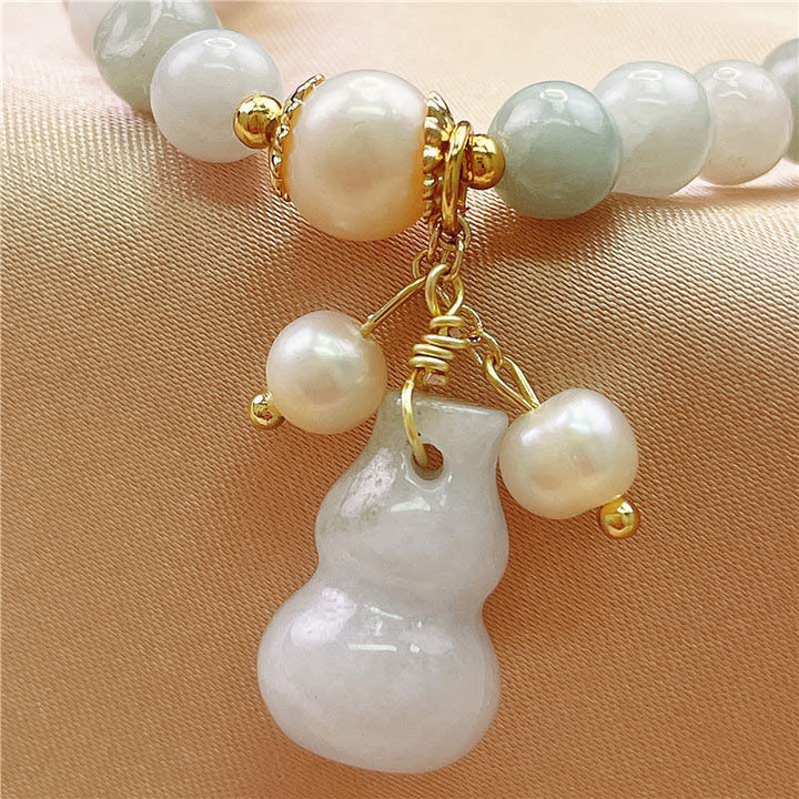 Bracelet à breloques en jade et Buddha Stones