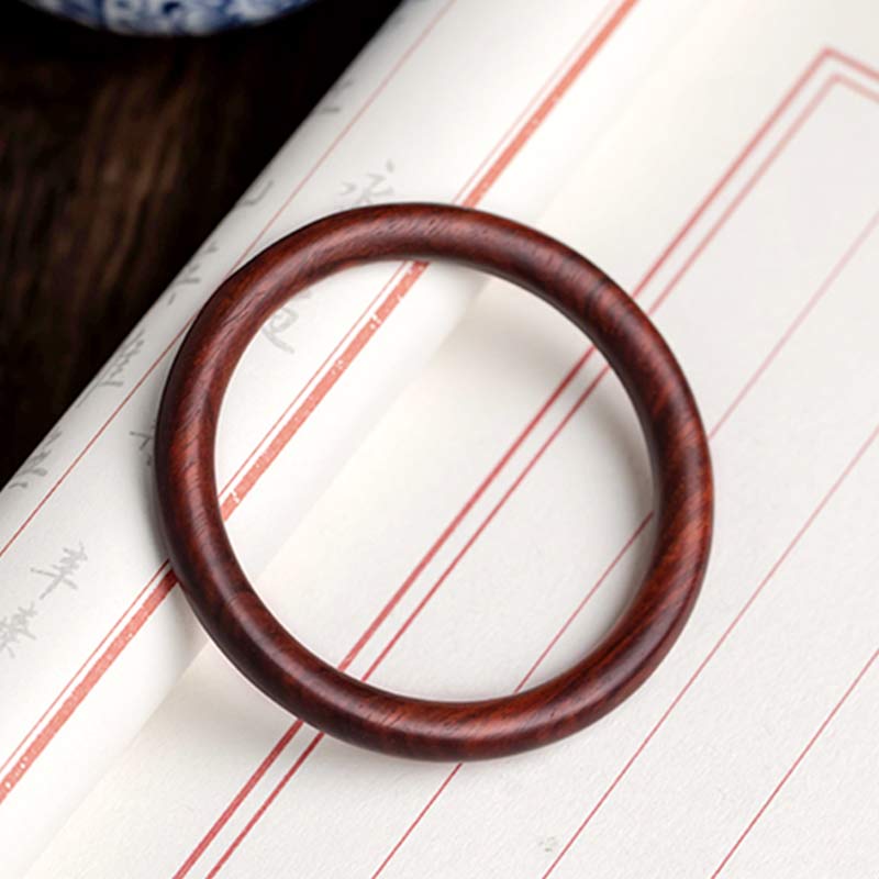 Bracelet de protection tibétain en petites feuilles de bois de santal rouge et ébène avec Buddha Stones