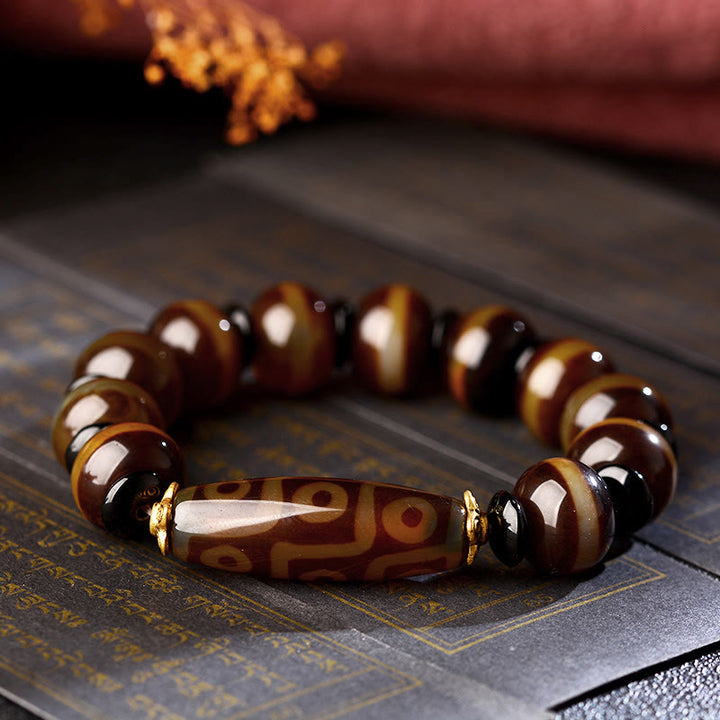 Bracelet tibétain en agate naturelle à neuf yeux avec perles dzi et Buddha Stones