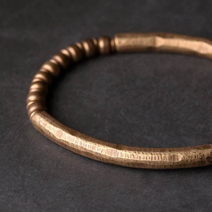Bracelet manchette d'équilibre en cuivre et pierre de lave