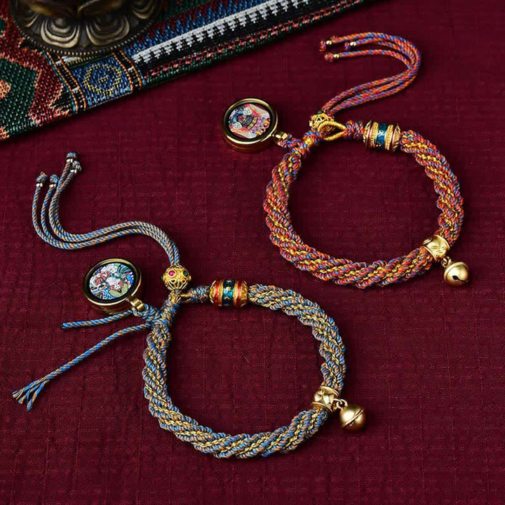 Bracelet tibétain fait main avec breloque en corde tressée et roue de prière Thangka pour protection de la chance
