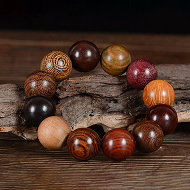 Bracelet de guérison et de protection en bois de santal multicolore Buddha Stones