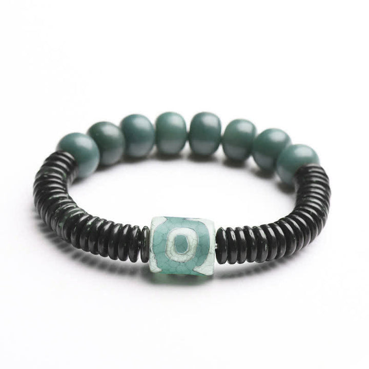 Bracelet tibétain en perles de graines Bodhi Dzi cyan en coquille de noix de coco pour éloigner les mauvais esprits