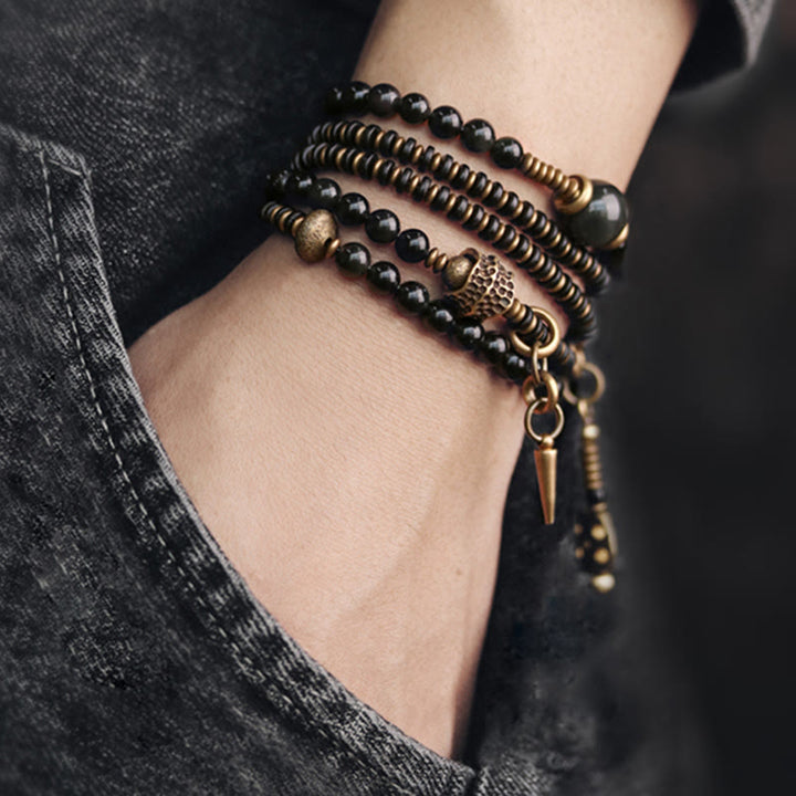 Bracelet multicouche positif en cuivre et bois d'ébène avec Buddha Stones arc-en-ciel obsidienne