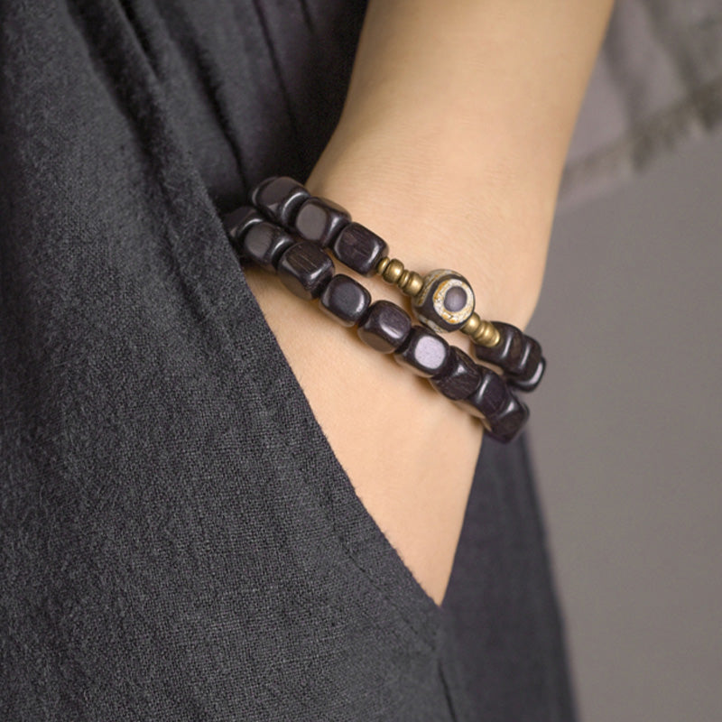 Bracelet couple paix en cuivre avec perles dzi en bois d'ébène