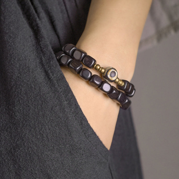 Bracelet couple paix en cuivre avec perles dzi en bois d'ébène
