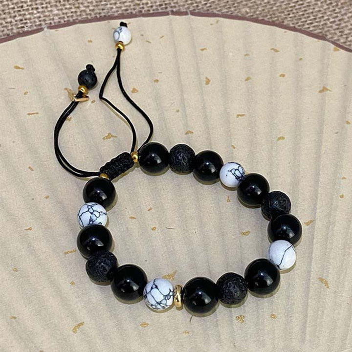 Bracelet de force Yin Yang en pierre de lave en obsidienne noire Buddha Stones