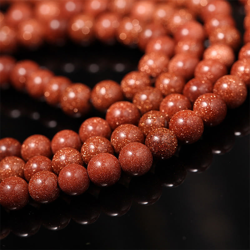 Bracelet de confiance avec 108 perles Mala en Buddha Stones Goldstone Om Mani Padme Hum Swastika