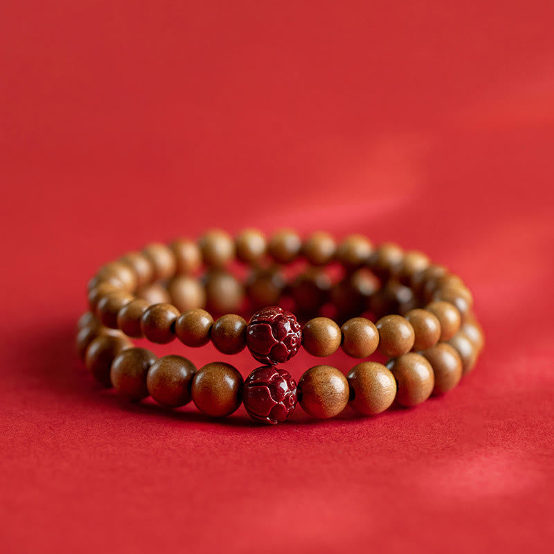 Bracelet Buddha Stones Bois de pêche Lotus Cinabre Chance Richesse