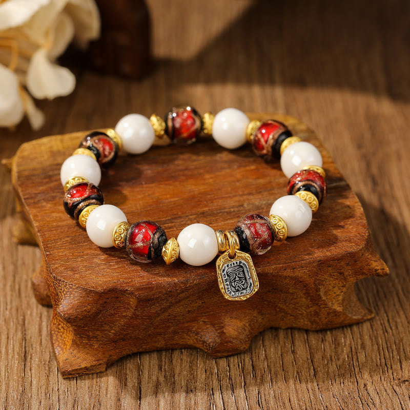 Bracelet de protection en perles de porcelaine en cendres et en verre Liuli avec breloque en Buddha Stones et déesse de la richesse tibétaine Zakiram