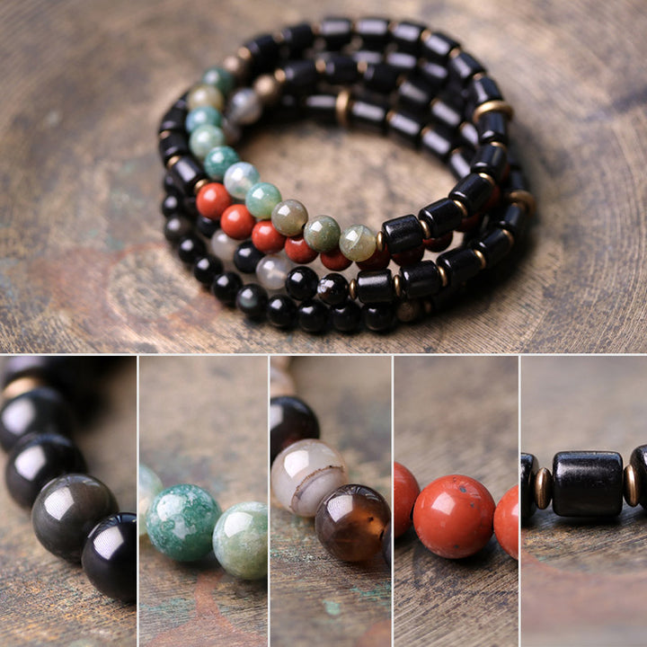 Bracelet couple paix Buddha Stones bois d'ébène jaspe rouge mousse agate cristal cuivre