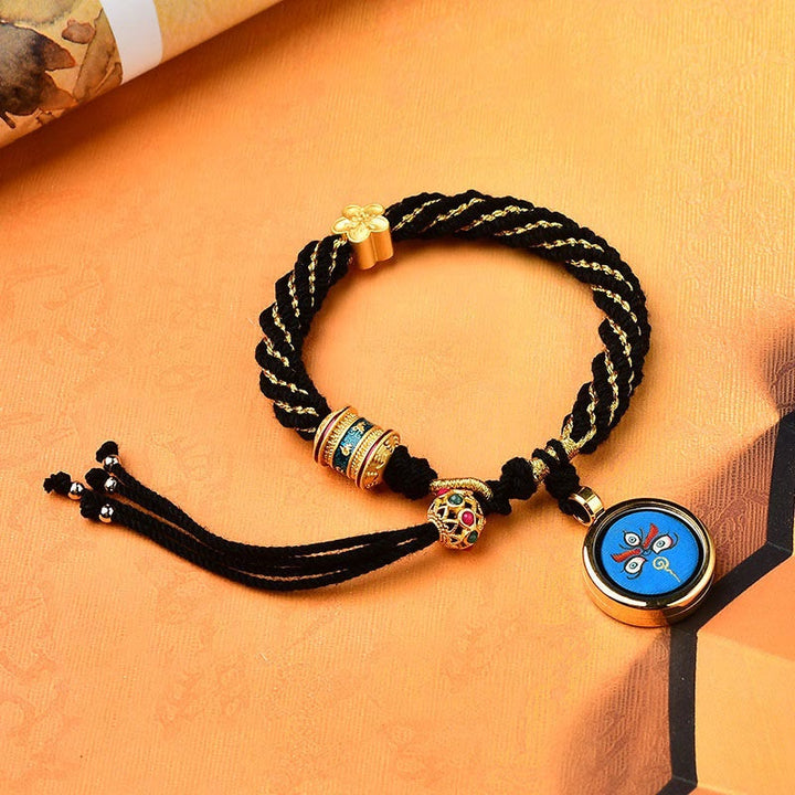 Bracelet en corde tissée avec breloque en forme de fleur et roue de prière en Buddha Stones faites à la main avec cinq dieux de la richesse et de la chance