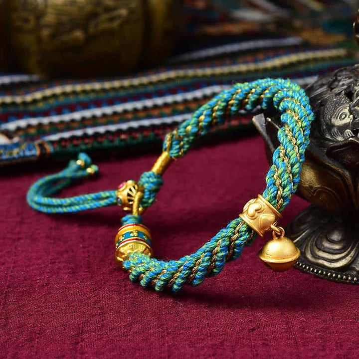Bracelet tibétain fait main avec breloque en corde tressée et roue de prière Thangka pour protection de la chance