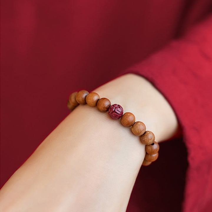 Bracelet Buddha Stones Bois de pêche Lotus Cinabre Chance Richesse