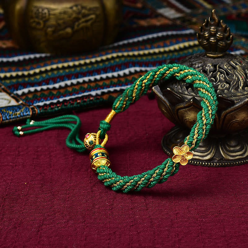 Bracelet en corde tissée avec breloque en forme de fleur et roue de prière en Buddha Stones faites à la main avec cinq dieux de la richesse et de la chance