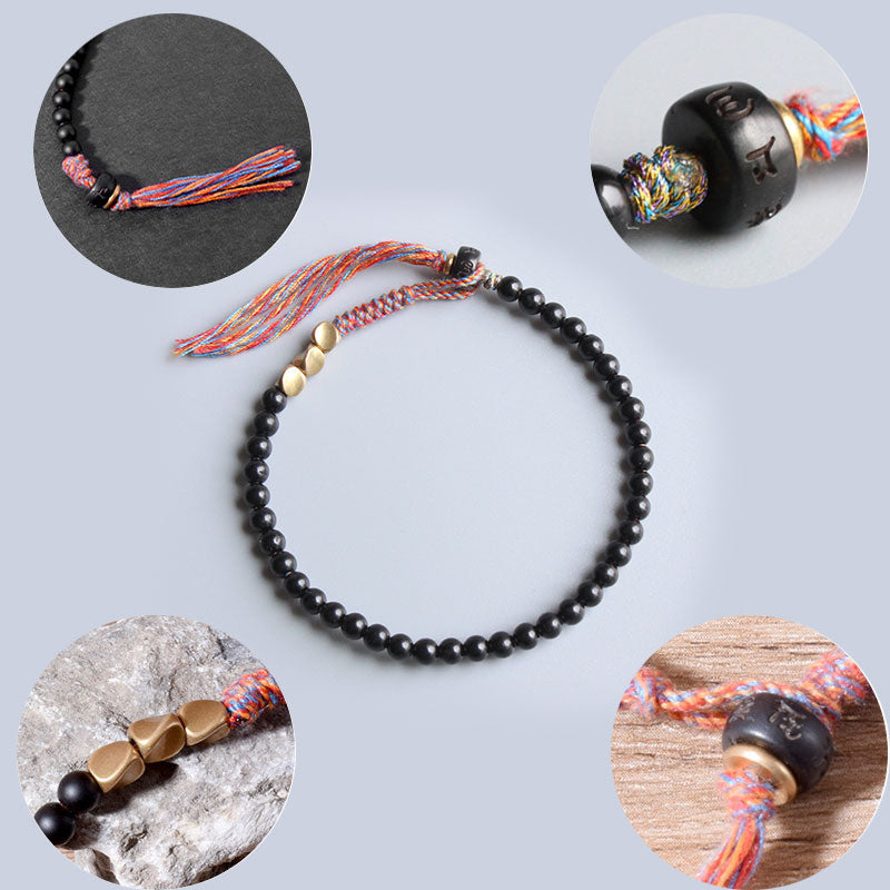 Bracelet à pampilles en onyx noir tibétain fait main avec Buddha Stones