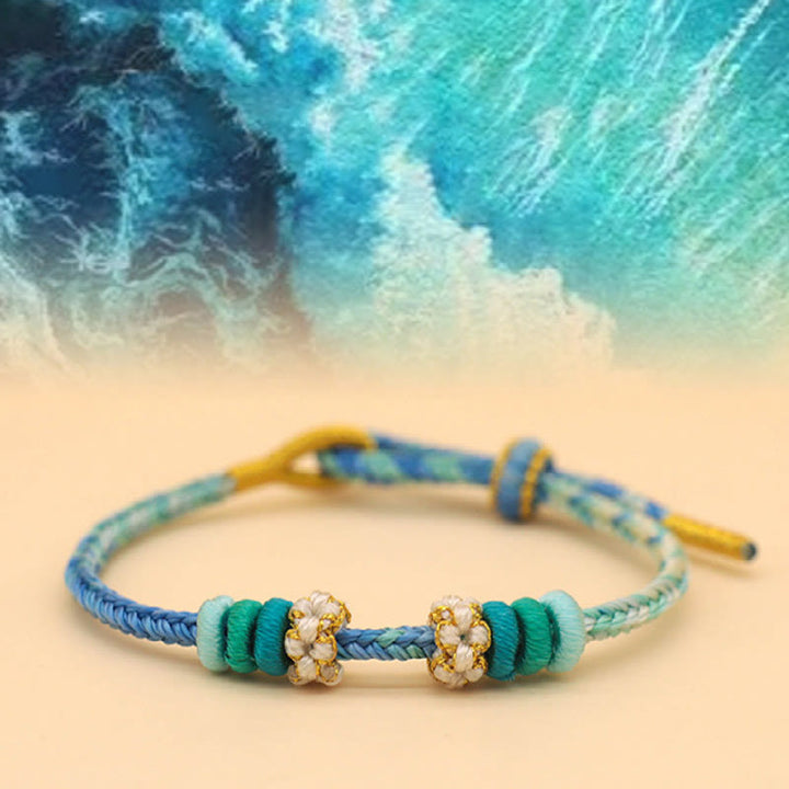 Bracelet tressé fait main en corde porte-bonheur avec nœud de paix à huit fils et nœud de fleur de pêcher en Buddha Stones - Bleu Mer (Bleu Vert) (Tour de poignet 14-18 cm) - image 10