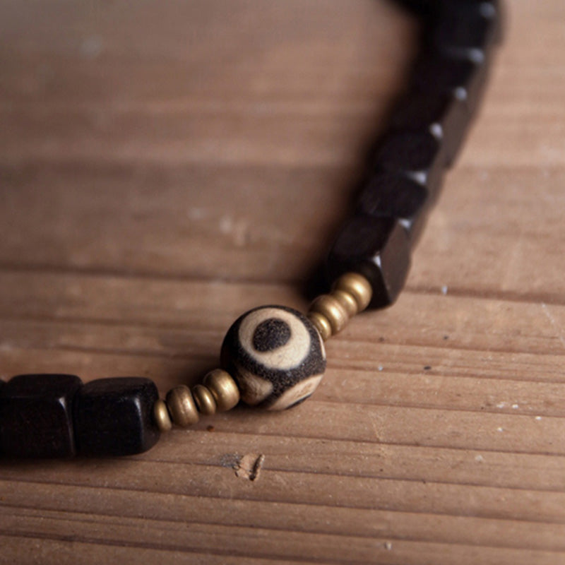 Bracelet couple paix en cuivre avec perles dzi en bois d'ébène