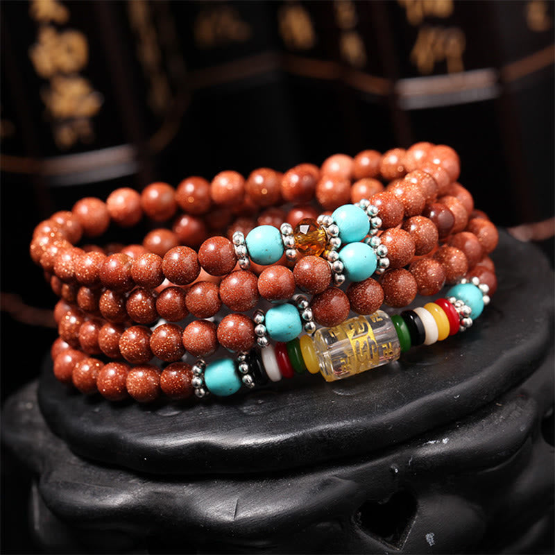 Bracelet de confiance avec 108 perles Mala en Buddha Stones Goldstone Om Mani Padme Hum Swastika