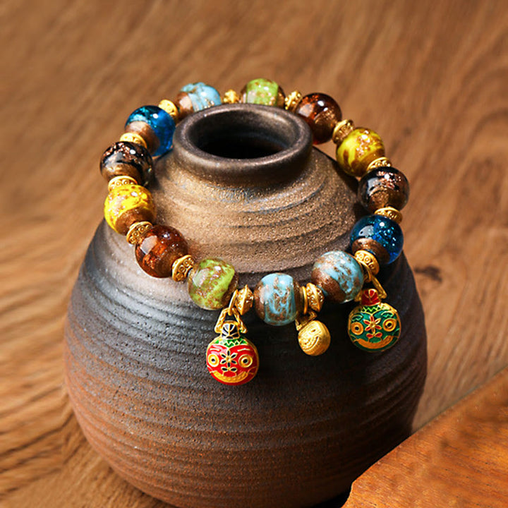 Bracelet porte-bonheur en perles de verre Liuli avec breloque de la famille des bêtes avaleuses en or et Buddha Stones