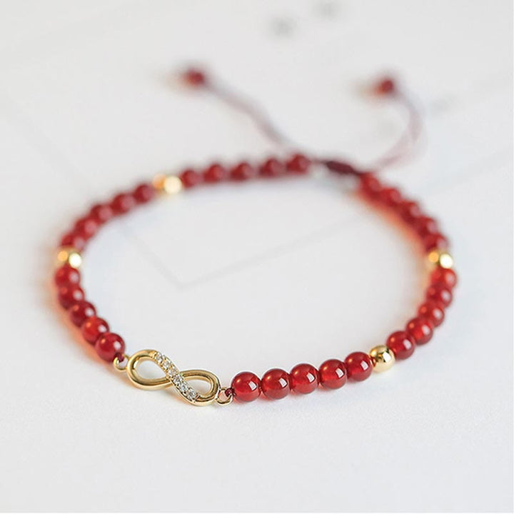 Bracelet de confiance en forme d'étoile à quatre feuilles en agate rouge naturelle avec nœud sans fin