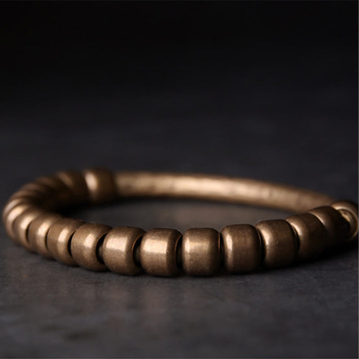 Bracelet porte-bonheur en perles de cuivre et de laiton au design simple Buddha Stones