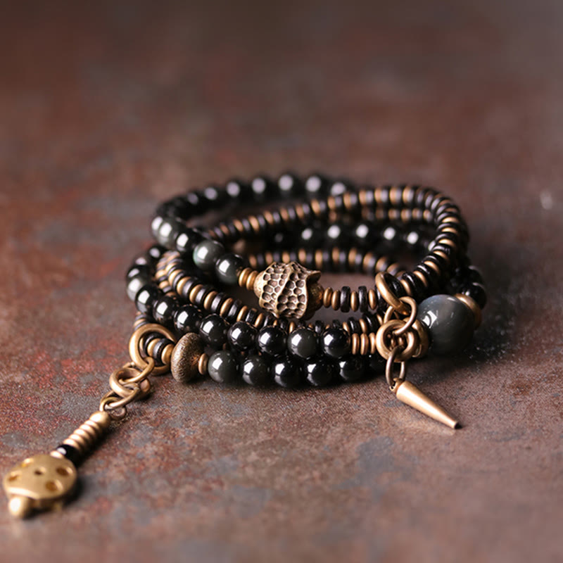 Bracelet multicouche positif en cuivre et bois d'ébène avec Buddha Stones arc-en-ciel obsidienne